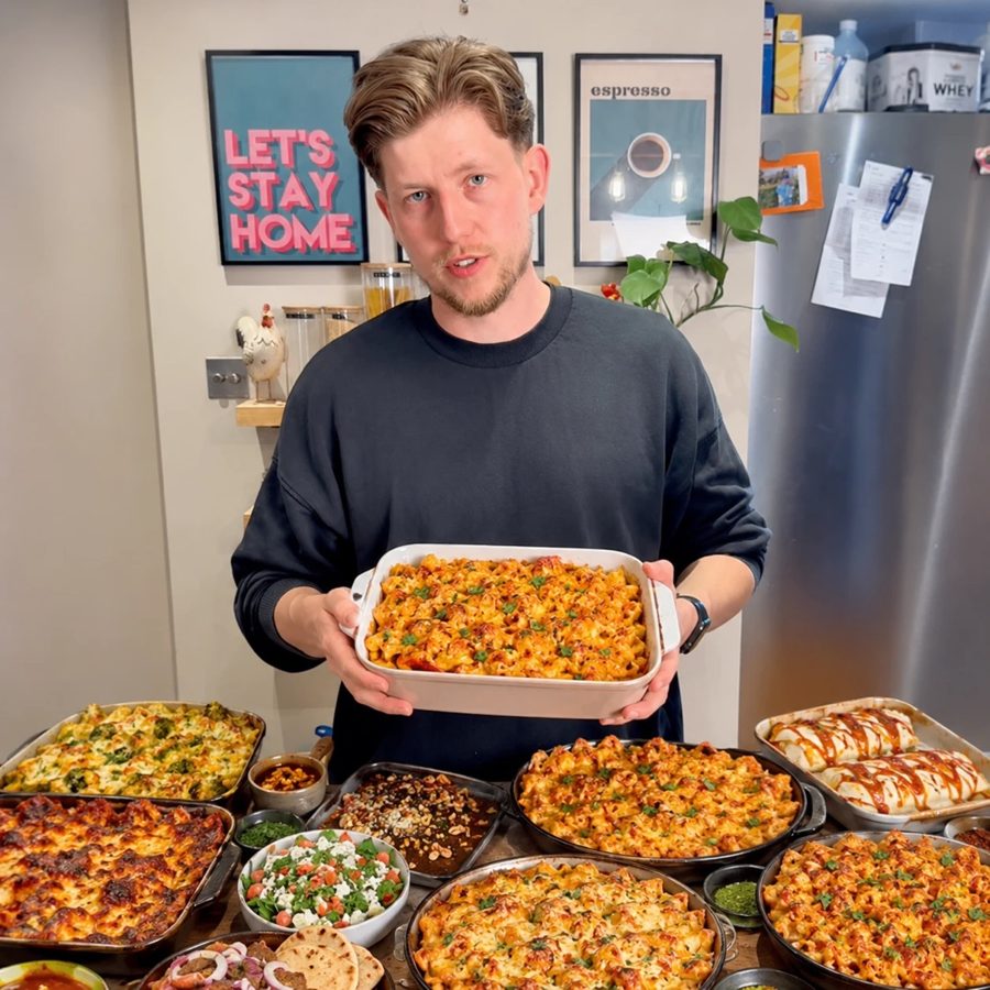 Jake Avery with a table of family dinners